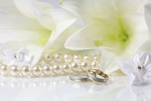 گل سفید حلقه ازدواج جشن عروسی
