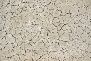 پس زمینه زمین خشک ترک خرده 