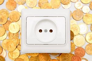 پریز برق سکه پول صرفه جویی در مصرف برق