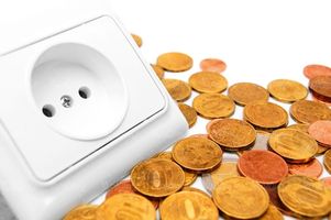 پریز برق سکه پول صرفه جویی در مصرف برق