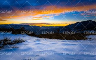 تصویر با کیفیت منظره غروب خورشید به همراه کوهستان