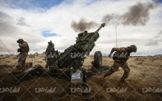 تصویر با سلاح سنگین به همراه سلاح و ماشین آلات نظامی