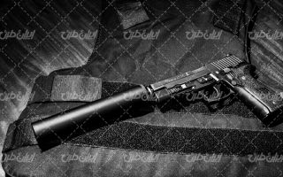 تصویر با کیفیت اسلحه کمری به همراه سلاح و ماشین آلات نظامی