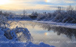 تصویر با کیفیت چشم انداز زیبای غروب آفتاب به همراه برف و طبیعت