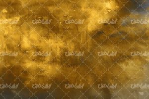 تصویر با کیفیت تکسچرطلایی همراه بک گراند طلایی و بافت طلایی