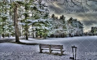 تصویر با کیفیت چشم انداز غروب آفتاب به همراه برف و طبیعت برفی