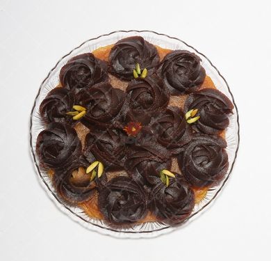 عکس با کیفیت حلوا آرد گندم تزئین شده