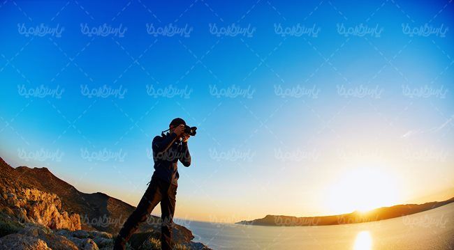 ساحل شنی  غروب دریا چشم انداز