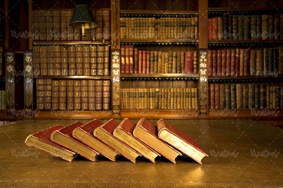کتابخانه قفسه کتاب کتاب های روی هم