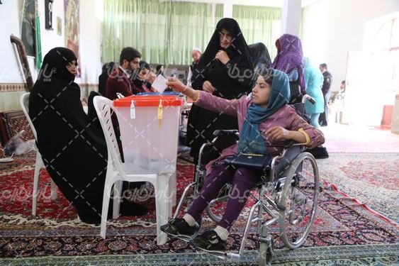 دانلود تصویر با کیفیت حضور معلولین در انتخابات