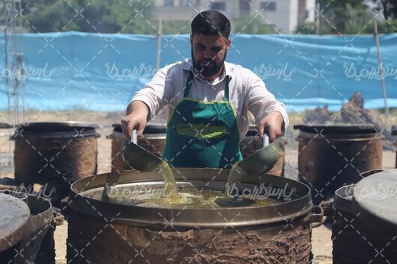 تصویر تهیه آش نذری