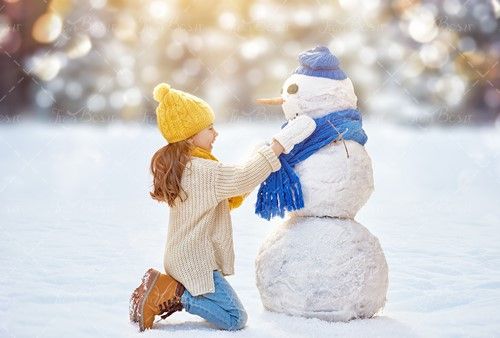 شال گردن و کلاه آبی آدم برفی دختربچه