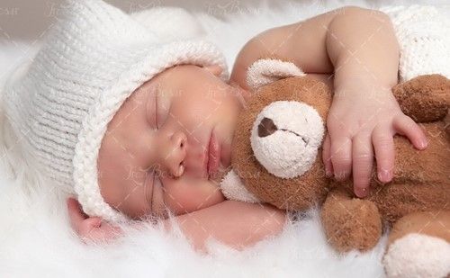عروسک خرسی کودک کلاه سفید بچه