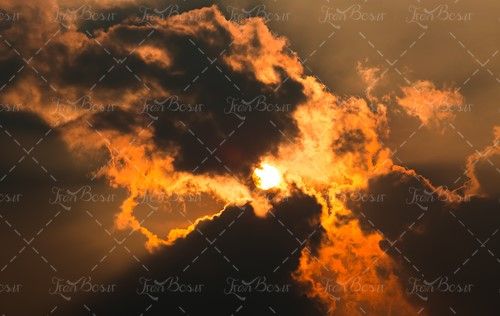 ابر سیاه ابر نارنجی خورشید آفتاب 