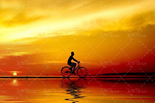 دریا غروب خورشید دوچرخه سواری 