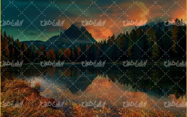 تصویر با کیفیت منظره زیبای غروب آفتاب همراه با دریاچه و درخت