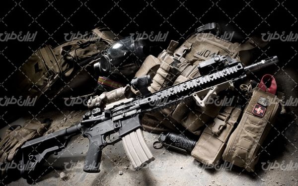 تصویر با کیفیت تفنگ به همراه سلاح و ماشین آلات نظامی