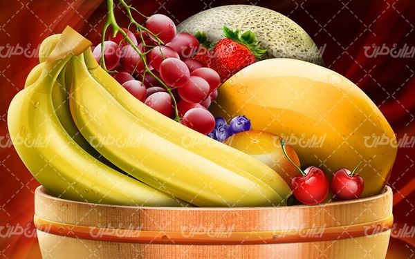 تصویر با کیفیت سبد میوه به همراه میوه های رنگارنگ و موز