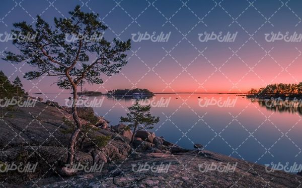 تصویر با کیفیت چشم انداز زیبای غروب آفتاب همراه با منظره و طبیعت زیبا