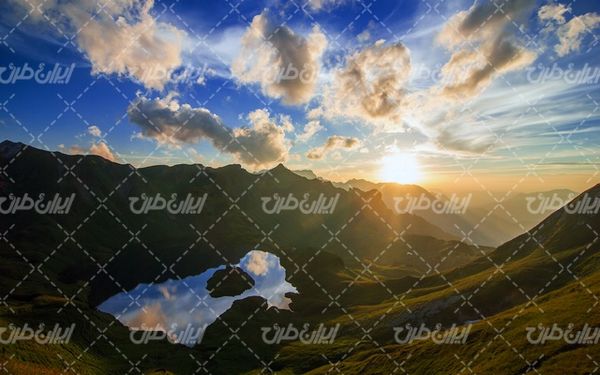 تصویر با کیفیت چشم انداز زیبای غروب آفتاب همراه با منظره و طبیعت زیبا