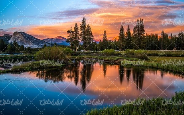 تصویر با کیفیت چشم انداز زیبای غروب آفتاب همراه با منظره و طبیعت زیبا