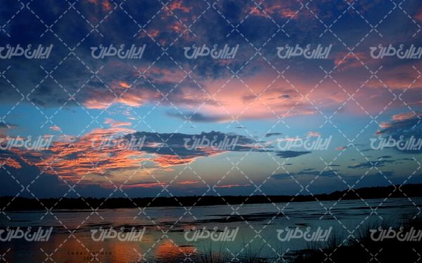 تصویر با کیفیت چشم انداز زیبای غروب آفتاب همراه با منظره دیدنی و طبیعت زیبا