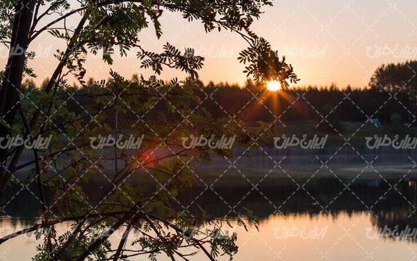 تصویر با کیفیت چشم انداز زیبای غروب آفتاب همراه با منظره دیدنی و طبیعت زیبا