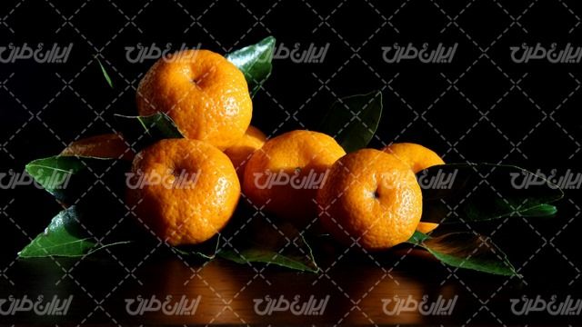 تصویر با کیفیت میوه همراه با نارنگی و میوه پاییزی