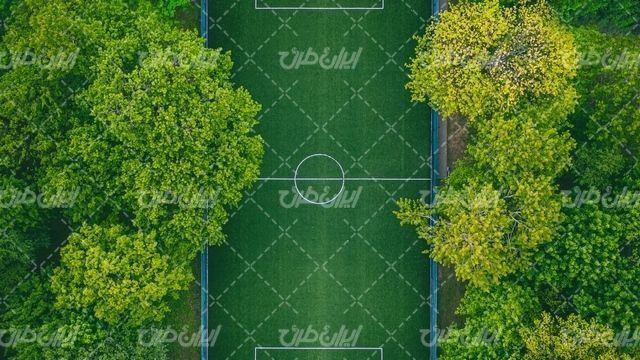 تصویر با کیفیت زمین چمن همراه با ورزشگاه و زمین فوتبال